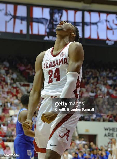 Brandon Miller of the Alabama Crimson Tide celebrates a basket and upcoming free throw during the second half against the Kentucky Wildcats at...