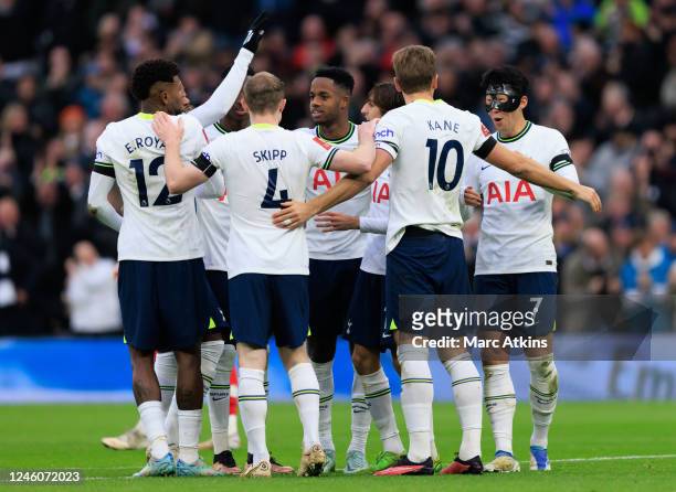 Harry Kane of Tottenham Hotspur celebrates scoring his goal with team mates during the Emirates FA Cup Third Round match between Tottenham Hotspur...