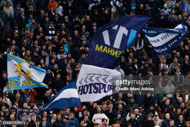 Tottenham Hotspur fans wave banners and flags during the Emirates FA Cup Third Round match between Tottenham Hotspur and Portsmouth at Tottenham...
