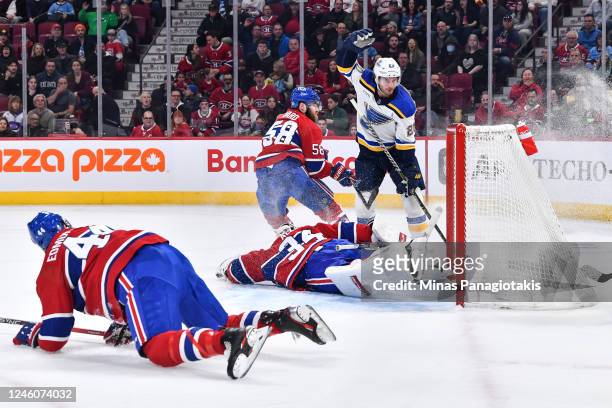Brandon Saad of the St. Louis Blues celebrates a goal as goaltender Jake Allen of the Montreal Canadiens lays on the ice during the first period of...