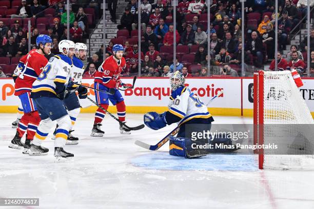 Joel Armia of the Montreal Canadiens scores on goaltender Jordan Binnington of the St. Louis Blues during the second period of the game at Centre...