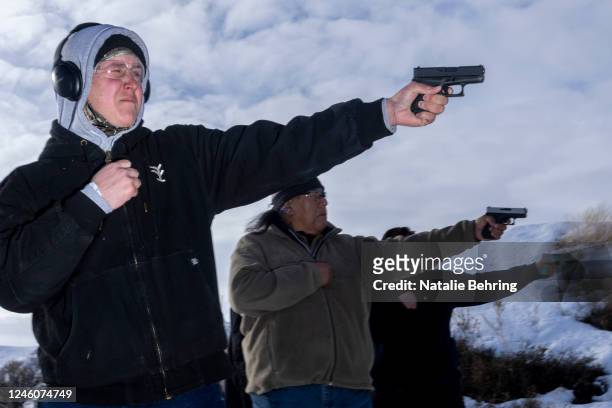 Ryan Patton practices shooting a Glock pistol at a concealed carry permit class on January 7, 2023 in Rexburg, Idaho. The state of Idaho allows...