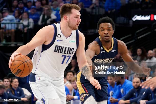 Luka Doncic of the Dallas Mavericks controls the ball as Herbert Jones of the New Orleans Pelicans defends during the first half at American Airlines...