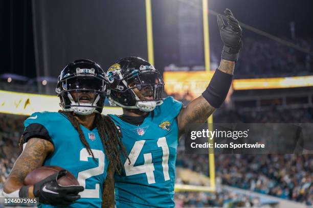 Jacksonville Jaguars safety Rayshawn Jenkins and Jacksonville Jaguars linebacker Josh Allen celebrate a touchdown during the game between the...