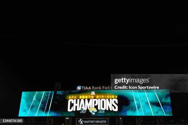 The AFC South Division Champions logo is shown on the scoreboard following the game between the Tennessee Titans and the Jacksonville Jaguars and the...