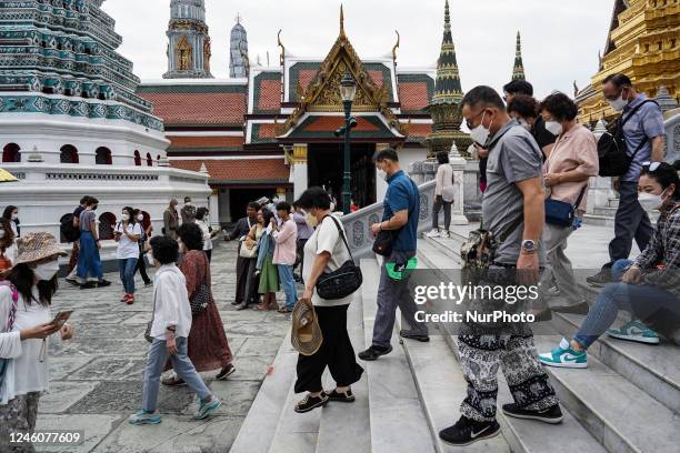 Tourists visit the Emerald Buddha Temple inside the Grand Palace in Bangkok, Thailand, 08 January 2023. Thailand is expected to welcome the return of...