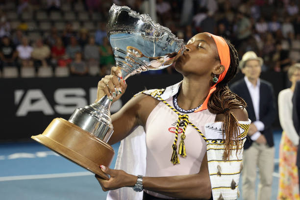 Coco Gauff of the US holds the trophy after victory in her womens final match against Spain's Rebeka Masarova at the ASB Classic Tennis Tournament in...
