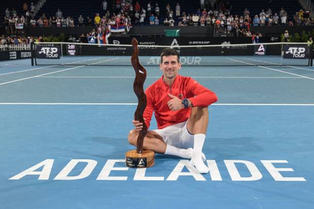 Serbian tennis player Novak Djokovic celebrates after winning the final of the ATP Adelaide International tournament against Sebastian Korda of the...