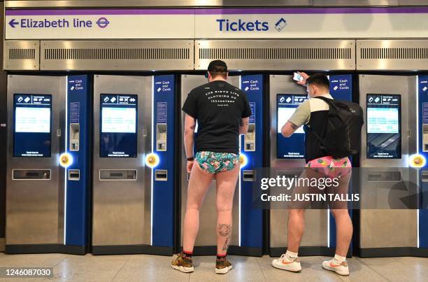 Tickets are purchased by people taking part in the annual 'No Trousers On The Tube Day' on the London Underground in central London on January 8,...