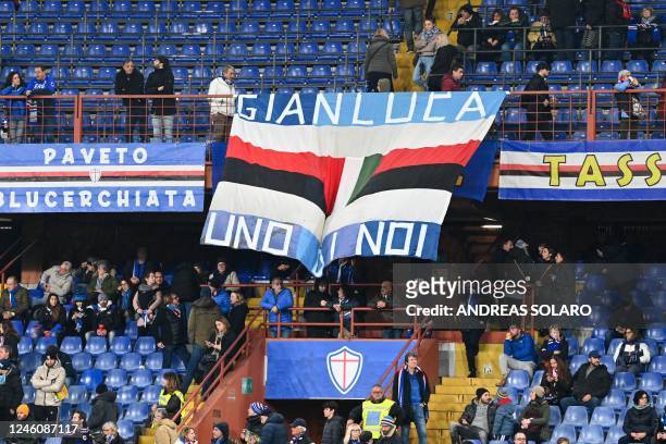 Banner reading "Gianluca, one of us" in tribute to late Italian footballer Gianluca Vialli is displayed in a tribune prior to the Italian Serie A...