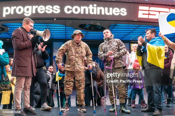 Roman Los and Mikola Zaritskiy, Ukrainian soldiers rehabilitating in the USA joined activists' protest against Russian aggression and war in Ukraine,...