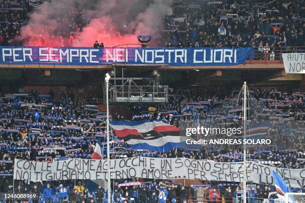 Sampdoria fans unfurl a giant tifo flocked with the number 9 to pay tribute to late Italian footballer Gianluca Vialli prior to the Italian Serie A...