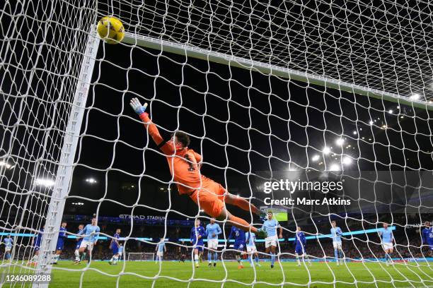 Kepa Arrizabalaga of Chelsea fails to stop the opening goal from Riyad Mahrez of Manchester City during the Emirates FA Cup Third Round match between...