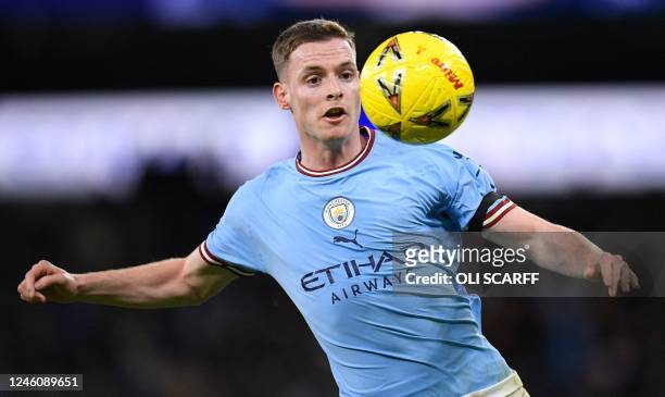 Manchester City's Spanish defender Sergio Gomez keeps his eyes on the ball during the English FA Cup third round football match between Manchester...