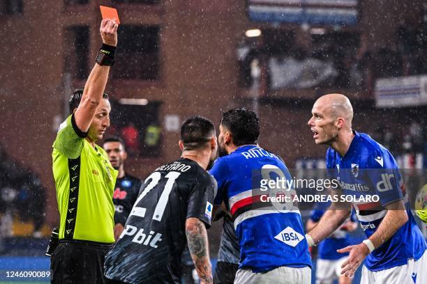 Italian referee Rosario Abisso gives a red card to Sampdoria's Venezuelan defender Tomas Rincon during the Italian Serie A football match between...