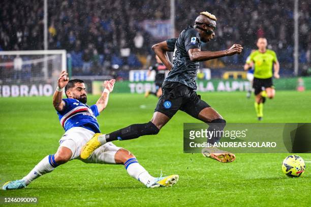 Sampdoria's Venezuelan defender Tomas Rincon tackles Napoli's Nigerian forward Victor Osimhen before receiving a red card for this foul during the...