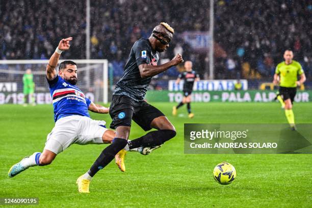 Sampdoria's Venezuelan defender Tomas Rincon tackles Napoli's Nigerian forward Victor Osimhen before receiving a red card for this foul during the...