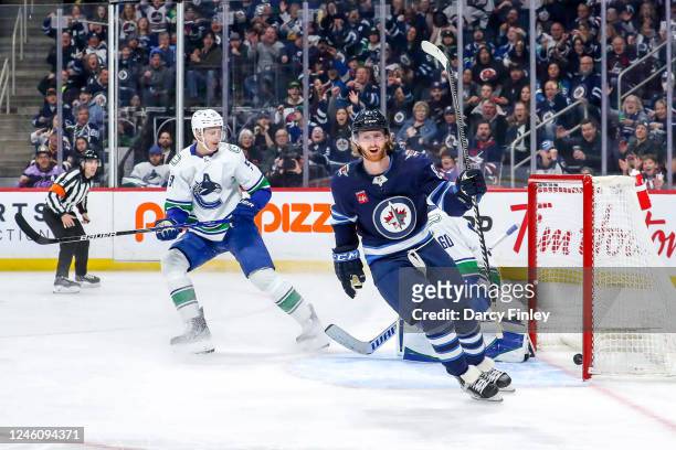 Kyle Connor of the Winnipeg Jets celebrates after scoring a first period goal against the Vancouver Canucks at the Canada Life Centre on January 8,...