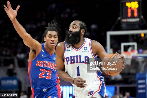 James Harden of the Philadelphia 76ers drives to the basket against Jaden Ivey of the Detroit Pistons during the first quarter at Little Caesars...