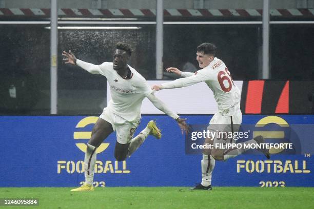 Roma's British forward Tammy Abraham celebrates after scoring with AS Roma's Swedish forward Benjamin Tahirovic during the Italian Serie A football...