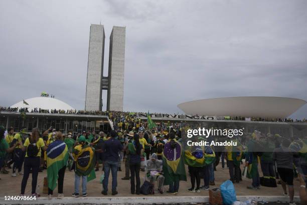 Supporters of former President Jair Bolsonaro clash with security forces as they raid the National Congress in Brasilia, Brazil, 08 January 2023....
