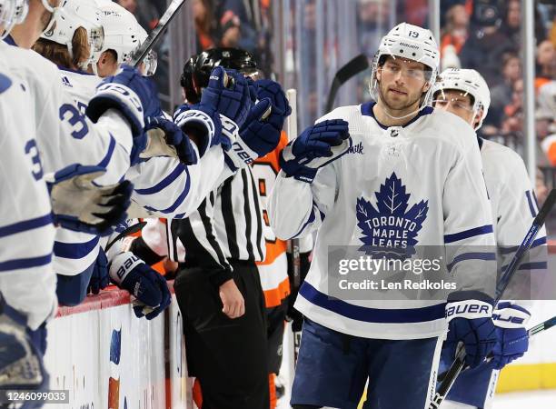 Calle Jarnkrok of the Toronto Maple Leafs celebrates his first period goal against the Philadelphia Flyers with his teammates on the bench at the...