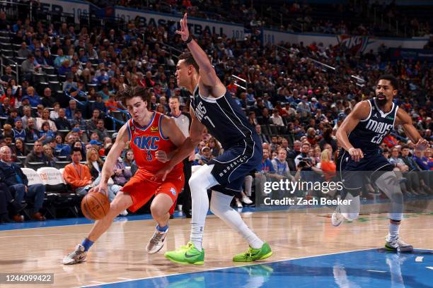 Josh Giddey of the Oklahoma City Thunder drives to the basket during the game against the Dallas Mavericks on January 8, 2023 at Paycom Arena in...