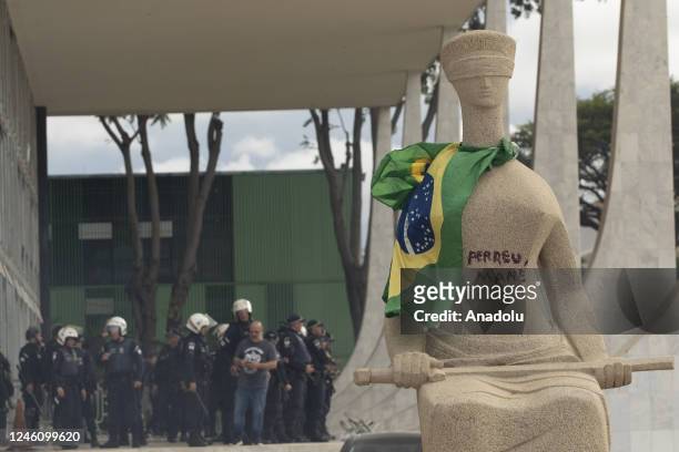 View of Lady Justice Statue at the supreme court as supporters of former President Jair Bolsonaro clash with security forces after raiding...
