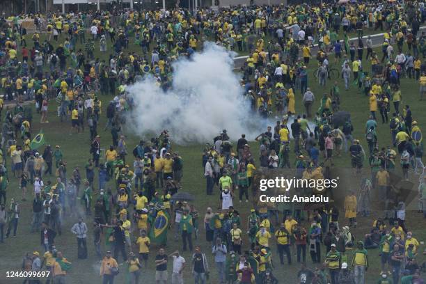 Supporters of former President Jair Bolsonaro clash with security forces as they raid the National Congress in Brasilia, Brazil, 08 January 2023....