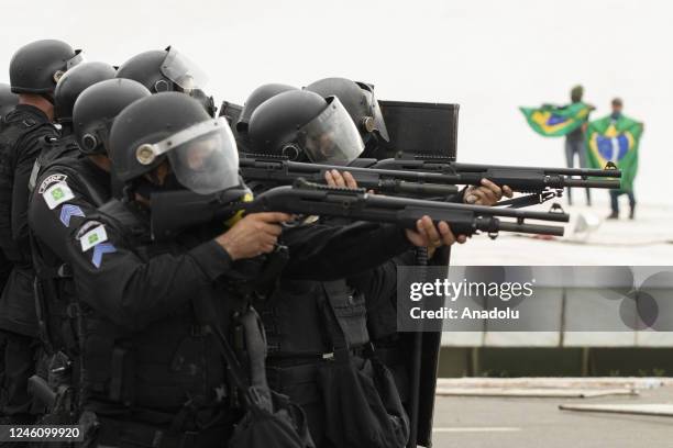 Supporters of former President Jair Bolsonaro clash with security forces as they raid the National Congress in Brasilia, Brazil, 08 January 2023....