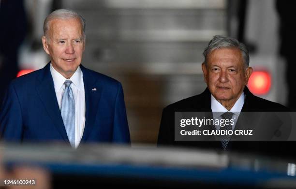 President Joe Biden is welcomed by his Mexican counterpart Andres Manuel Lopez Obrador upon landing at Felipe Angeles International Airport in...