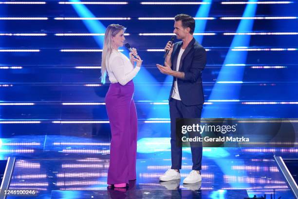 Beatrice Egli and Florian Silbereisen on stage during the Zum Allerletzten Mal: Der Große Schlagerabschied! TV Show on October 22, 2022 in Leipzig,...