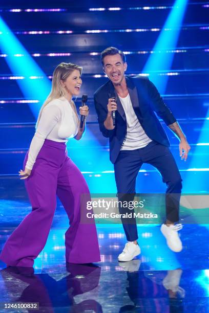 Beatrice Egli and Florian Silbereisen on stage during the Zum Allerletzten Mal: Der Große Schlagerabschied! TV Show on October 22, 2022 in Leipzig,...