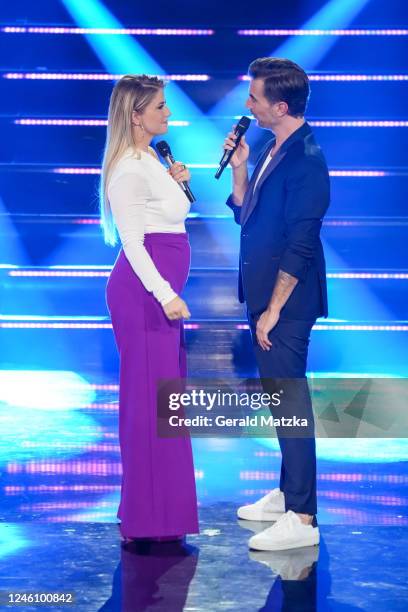 Beatrice Egli and Florian Silbereisen on stage during the Zum Allerletzten Mal: Der Große Schlagerabschied! TV Show on October 22, 2022 in Leipzig,...