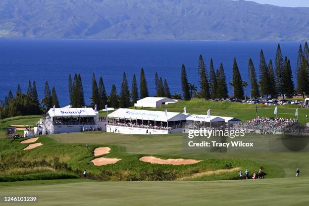 Crowds watch the action on the 18th fairway during the final round of the Sentry Tournament of Champions on The Plantation Course at Kapalua on...