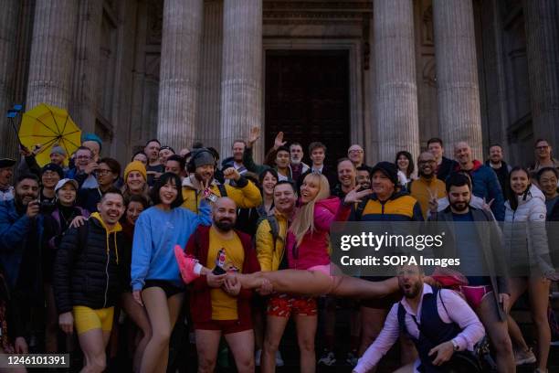 Participants of the "No Trousers Tube Ride" are seen posing for group photo outside the St Paul Cathedral in London. "No Trousers Tube Ride" returned...