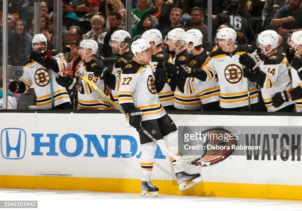 Hampus Lindholm of the Boston Bruins celebrates his goal with teammates during the third period against the Anaheim Ducks at Honda Center on January...