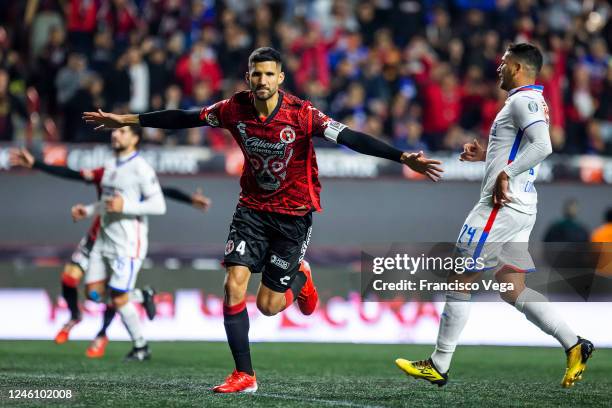 Lisandro Lopez of Tijuana celebrates after scoring the team's first goal during the 1st round match between Tijuana and Cruz Azul as part of the...