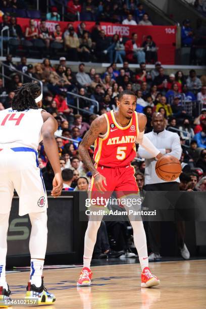Dejounte Murray of the Atlanta Hawks dribbles the ball during the game against the LA Clippers on January 8, 2023 at Crypto.Com Arena in Los Angeles,...