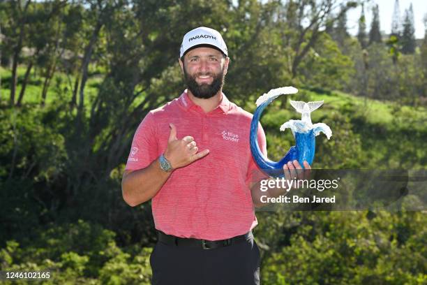 Jon Rahm of Spain holds the trophy on the 18th green after the final round of the Sentry Tournament of Champions on The Plantation Course at Kapalua...