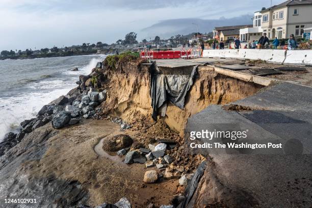 Portion of West Cliff Drive fell into the Pacific Ocean after a series of powerful storms of rain and high winds hit Californias Central Coast in...