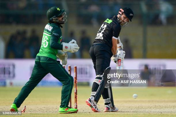 New Zealand's captain Kane Williamson is clean bowled by Pakistan's Usama Mir during the first one-day international cricket match between Pakistan...