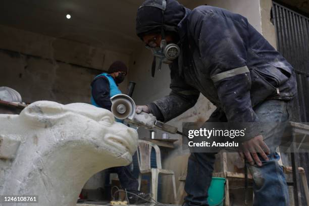 Sculptor polishes a sculpture of a gargoyle in La Paz, Bolivia on December 22, 2022. Ramiro Sirpa known as "the sculptor of giants" is an artist from...