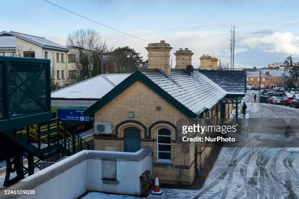 Malahide railway station after a snowfall. Malahide is a suburban town in the city of Dublin located in County Fingal . The town is located 10 miles...