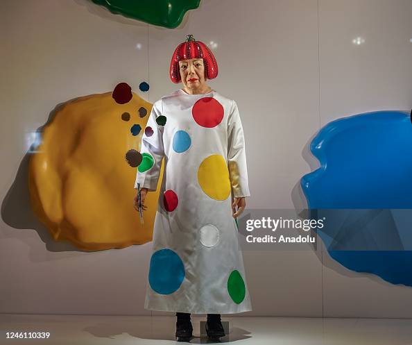 A Yayoi Kusama robot is painting the windows of this NYC Louis Vuitton store