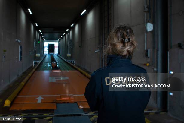 Customs officer picturd in the harbor of Rotterdam during a joint press moment of the Belgian and the Netherlands' customs authorities on the cocaine...
