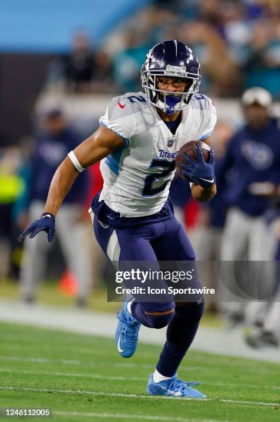 Tennessee Titans wide receiver Robert Woods runs with the ball during the game between the Tennessee Titans and the Jacksonville Jaguars and the on...