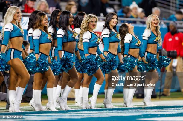 Members of The Roar, the Jacksonville Jaguars cheerleading squad, perform during the game between the Tennessee Titans and the Jacksonville Jaguars...