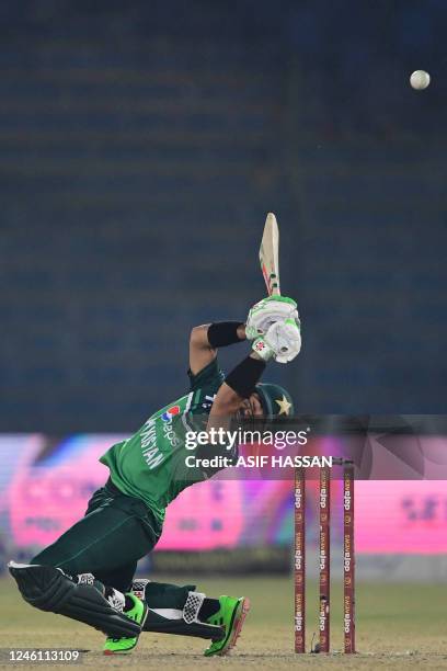 Pakistan's Mohammad Rizwan plays a shot during the first one-day international cricket match between Pakistan and New Zealand at the National Stadium...