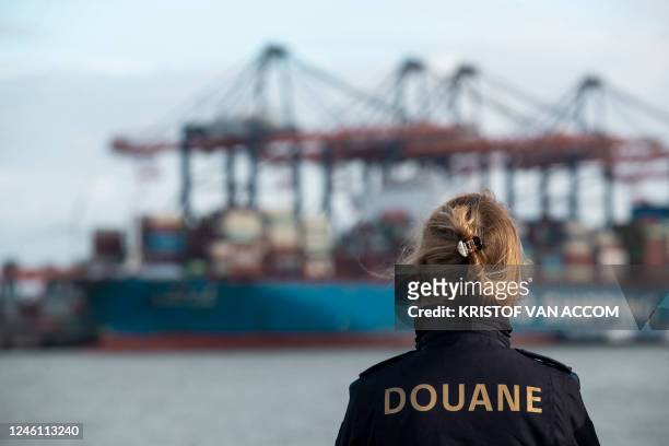 Illustration picture shows a customs officer in the harbor of Rotterdam during a joint press moment of the Belgian and the Netherlands' customs...